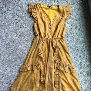 Pretty golden yellow and sparkly dress!